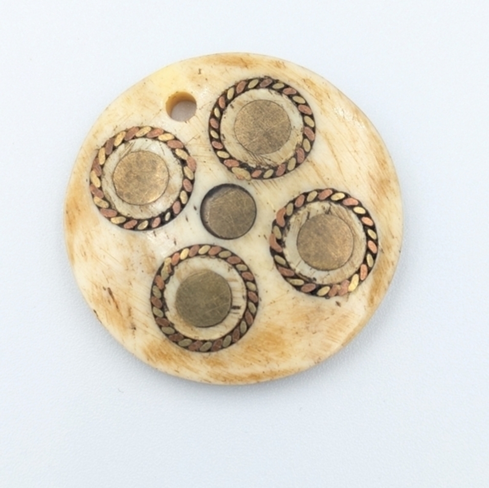 Vintage or antique twisted copper wire inlay bone round pendant
